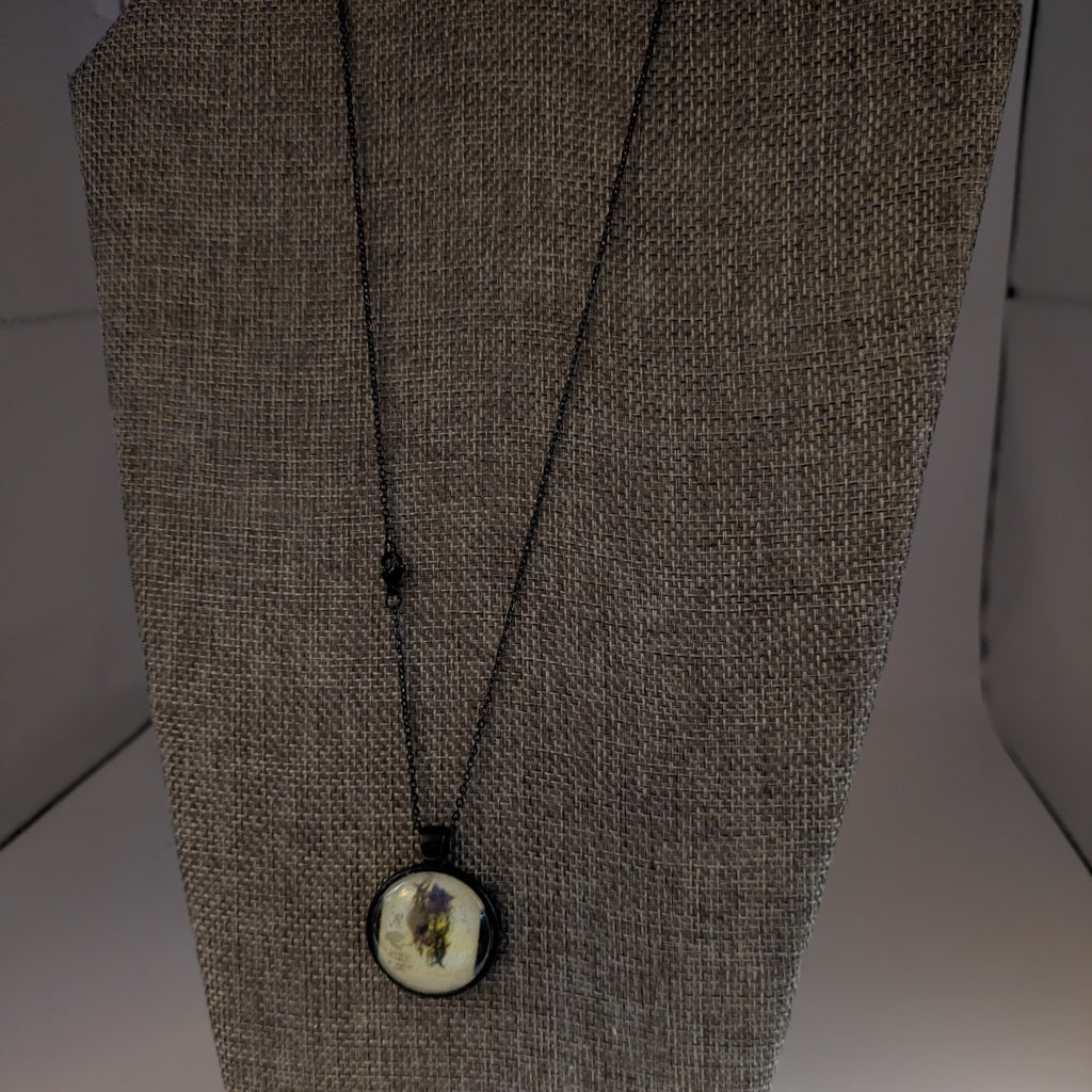 T.K. Human Heart Dome Necklace with Black enameled metal hardware.